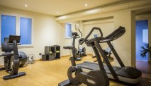 Fitnessruimte van het hotel